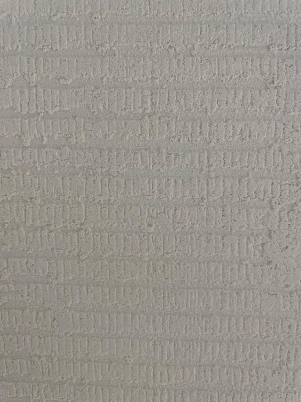 Enduit clair peigné en relief